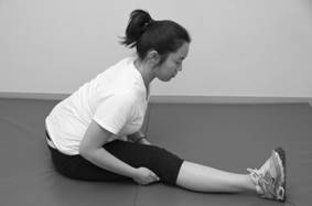 Image depicting runner's stretch (hamstrings) exercise.